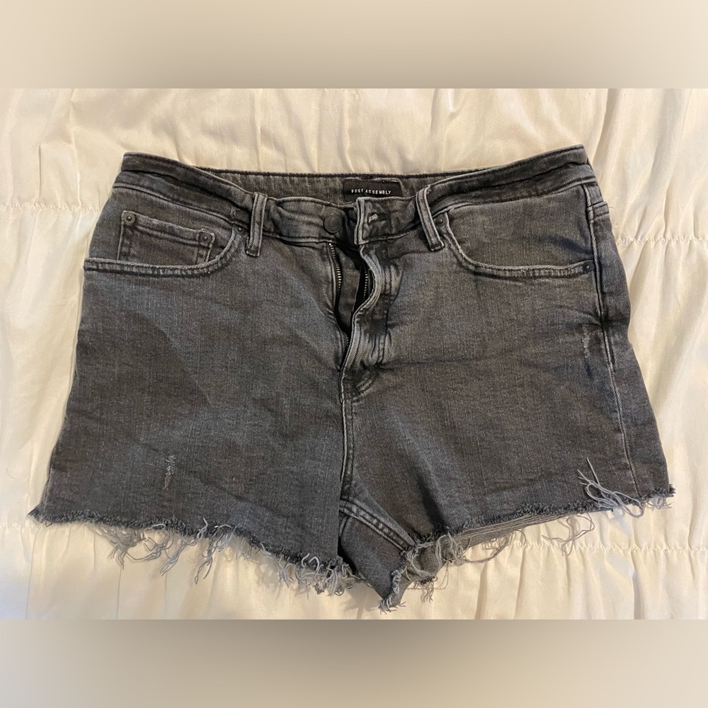 Free Assembly black frayed jean shorts.